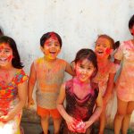 Children playing Holi
